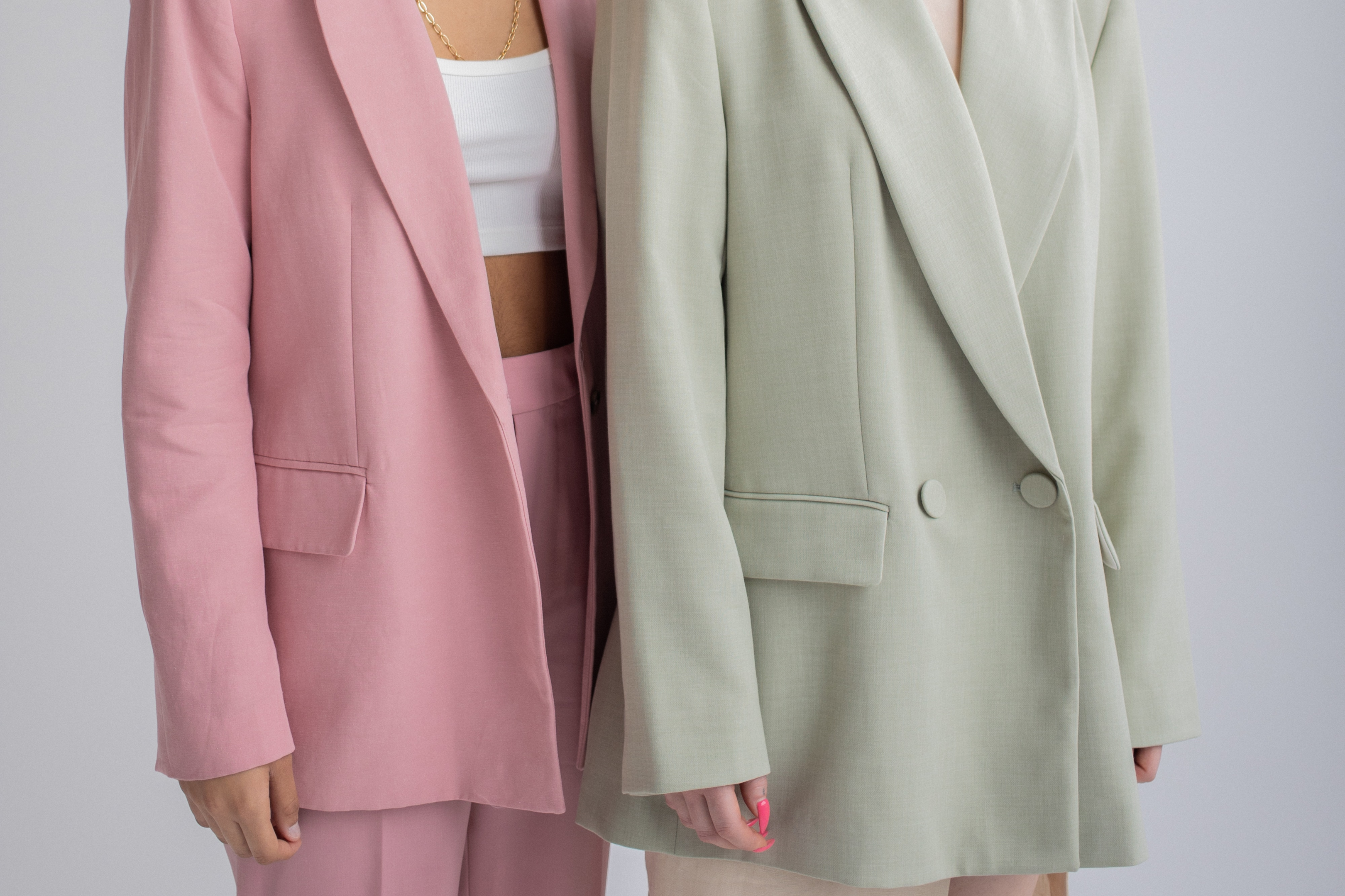 Simple blazers and trousers on pastel colors.